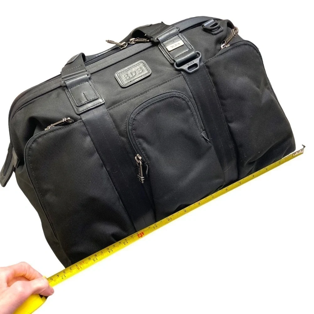 Tumi black alpha bravo soft duffle bag